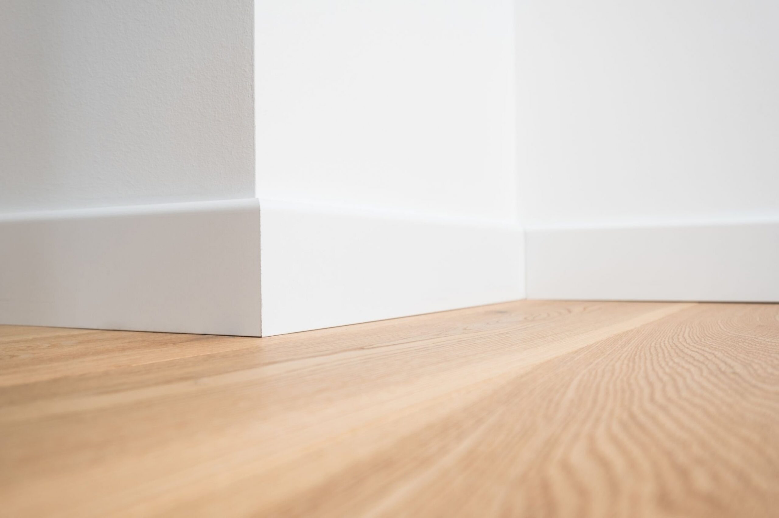 wooden floor and white walls