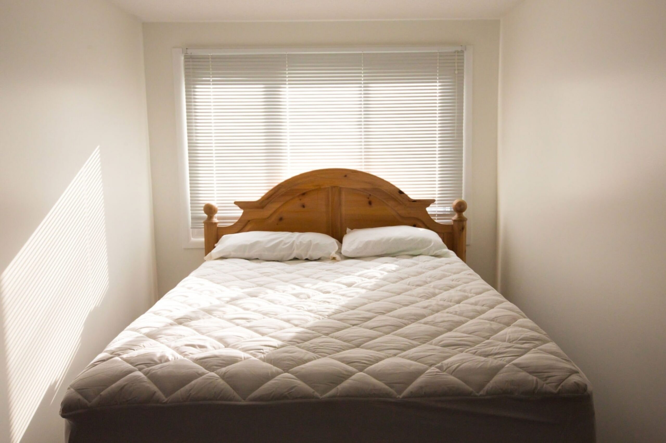 Small Bedroom with Bare Mattress